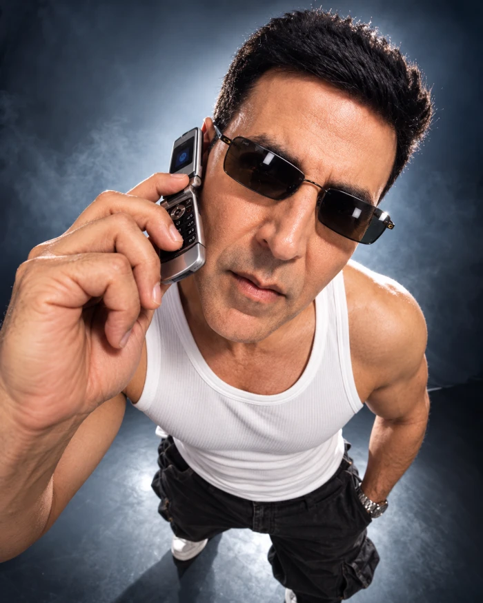 Dramatic low-angle phone-call portrait